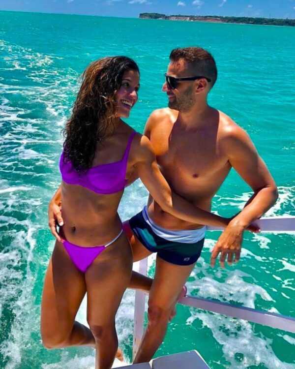 CASAL NO CATAMARÃ